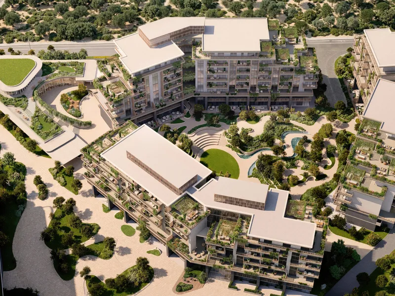 The three buildings from the air around the central green